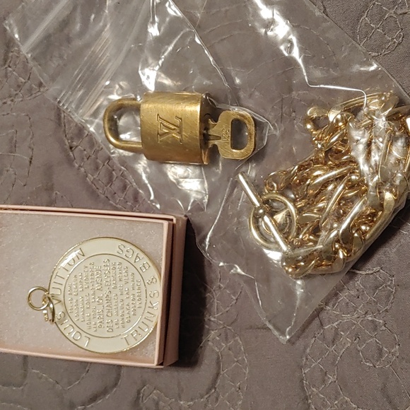 Louis Vuitton Other - Louis Vuitton lock & key # 321 with trunks & bag charm